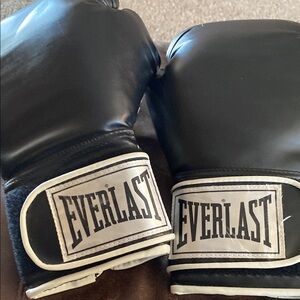 Everlast black boxing gloves.